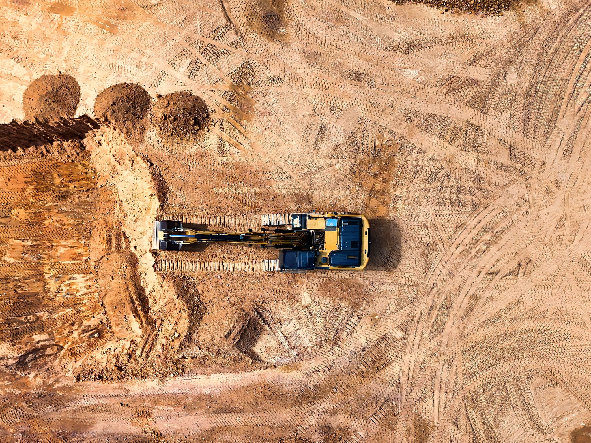 Aerial view of a residential land development site with new lots